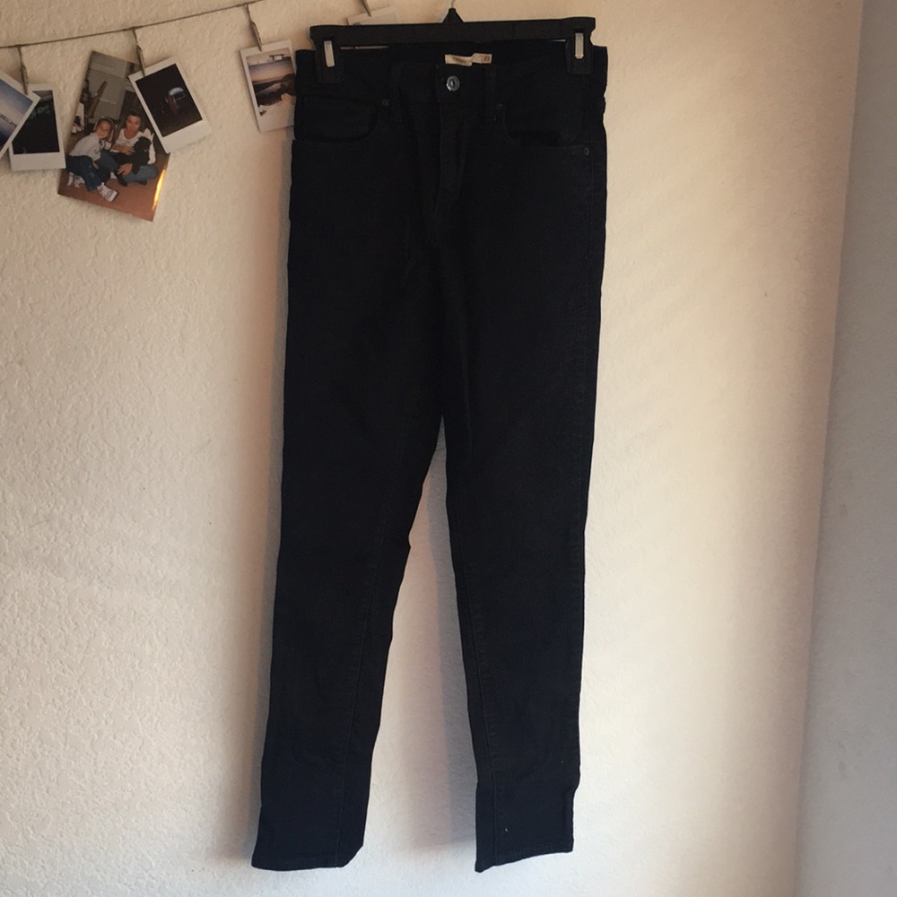 Levis 721 high rise skinny jeans in black size 27